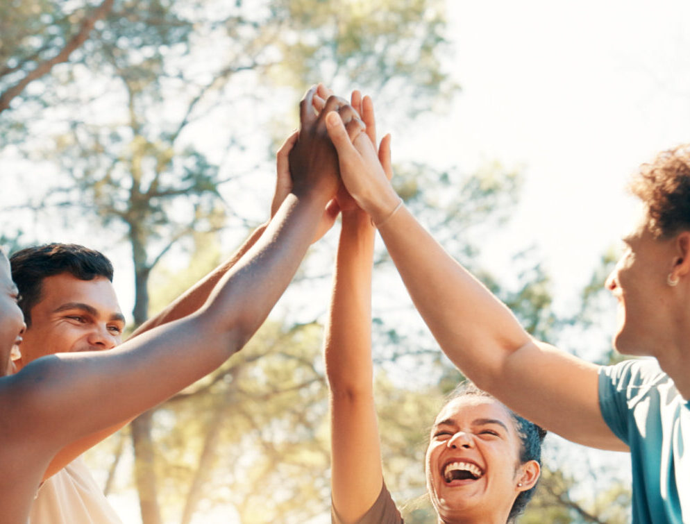 happy-people-fitness-high-five-huddle-workout-goals-winning-teamwork-nature-active-group-friends-with-smile-motivation-success-exercise-health-wellness-together